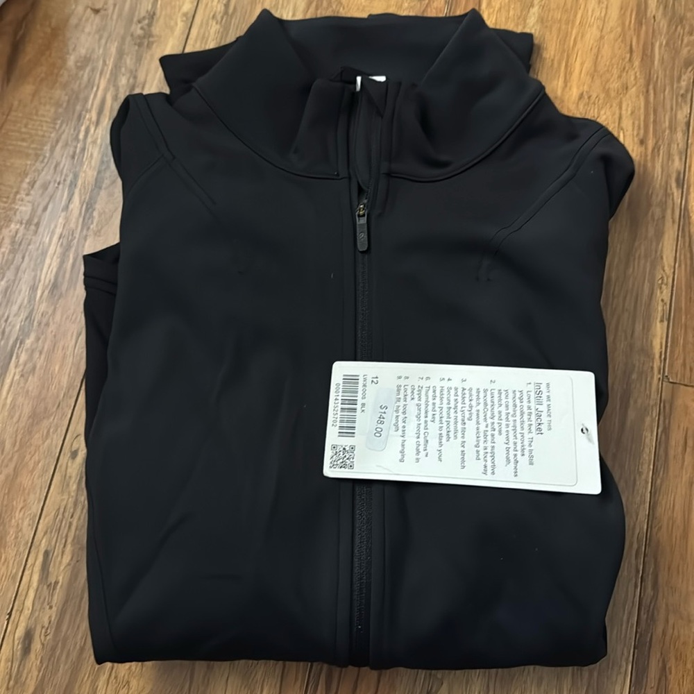 lululemon instill jacket size 12 in blk. NWT